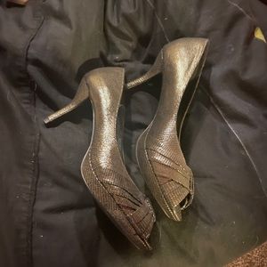 Worn 1x.  Gold dress barn heels, size 7